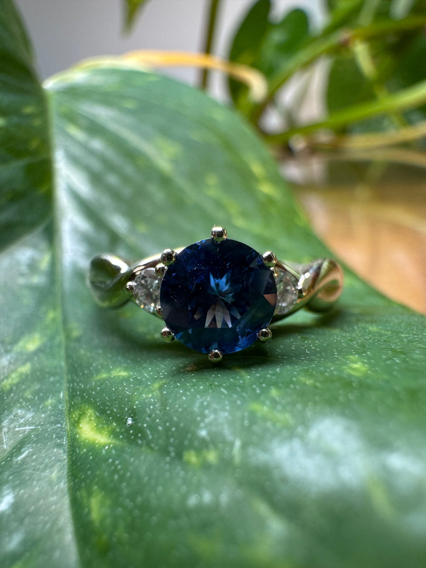 The Fairmined Sri Lankan Sapphire and Diamond Three-Stone Twist Ring (Ready to ship in size 6.25)