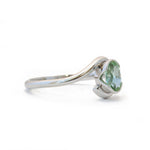 The Oval Solitaire Embrace - W.R. Metalarts