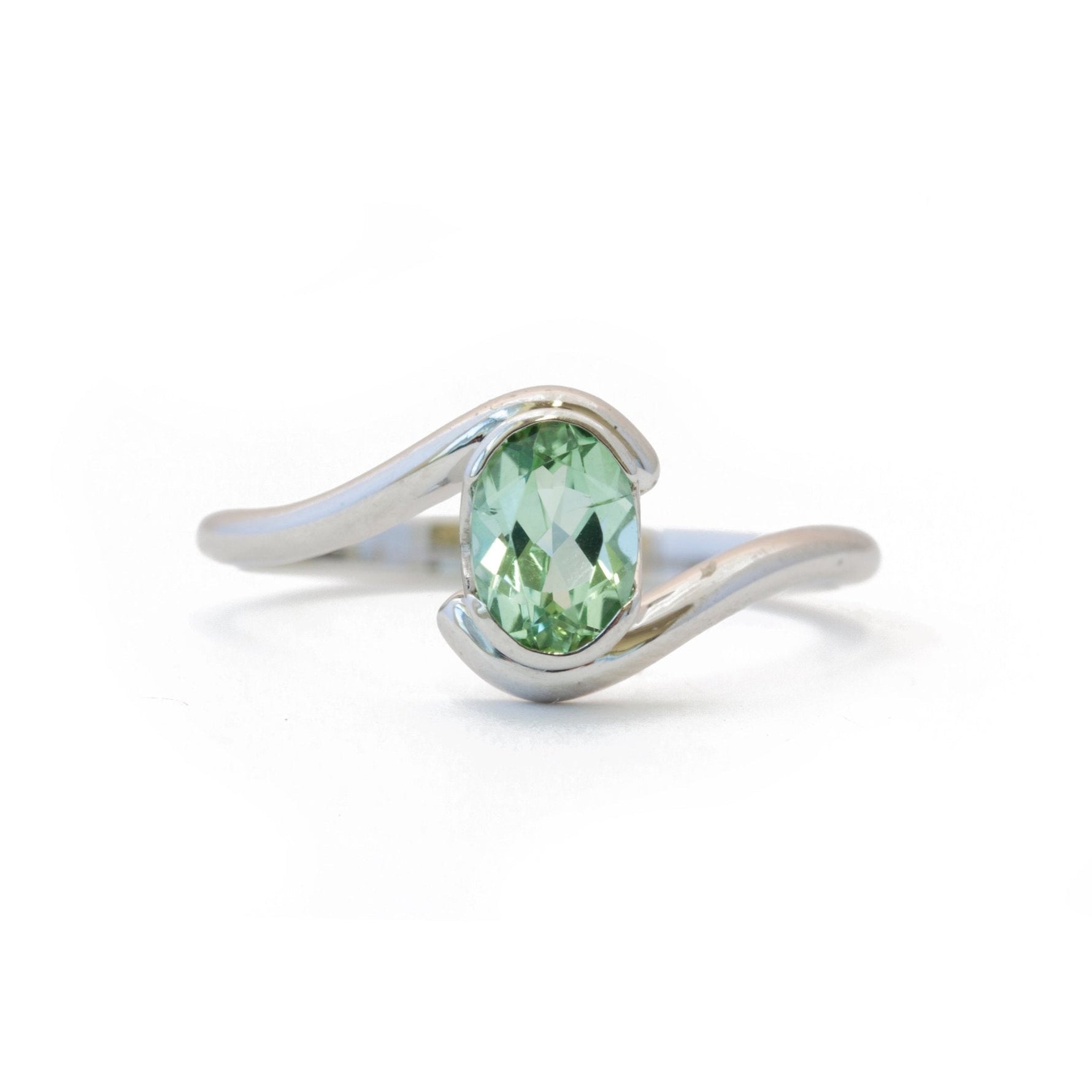 The Oval Solitaire Embrace - W.R. Metalarts