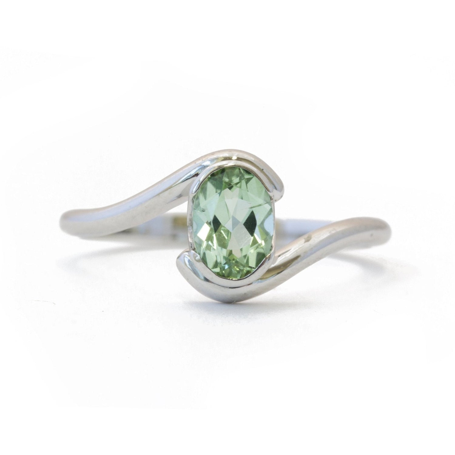 The Oval Solitaire Embrace - W.R. Metalarts