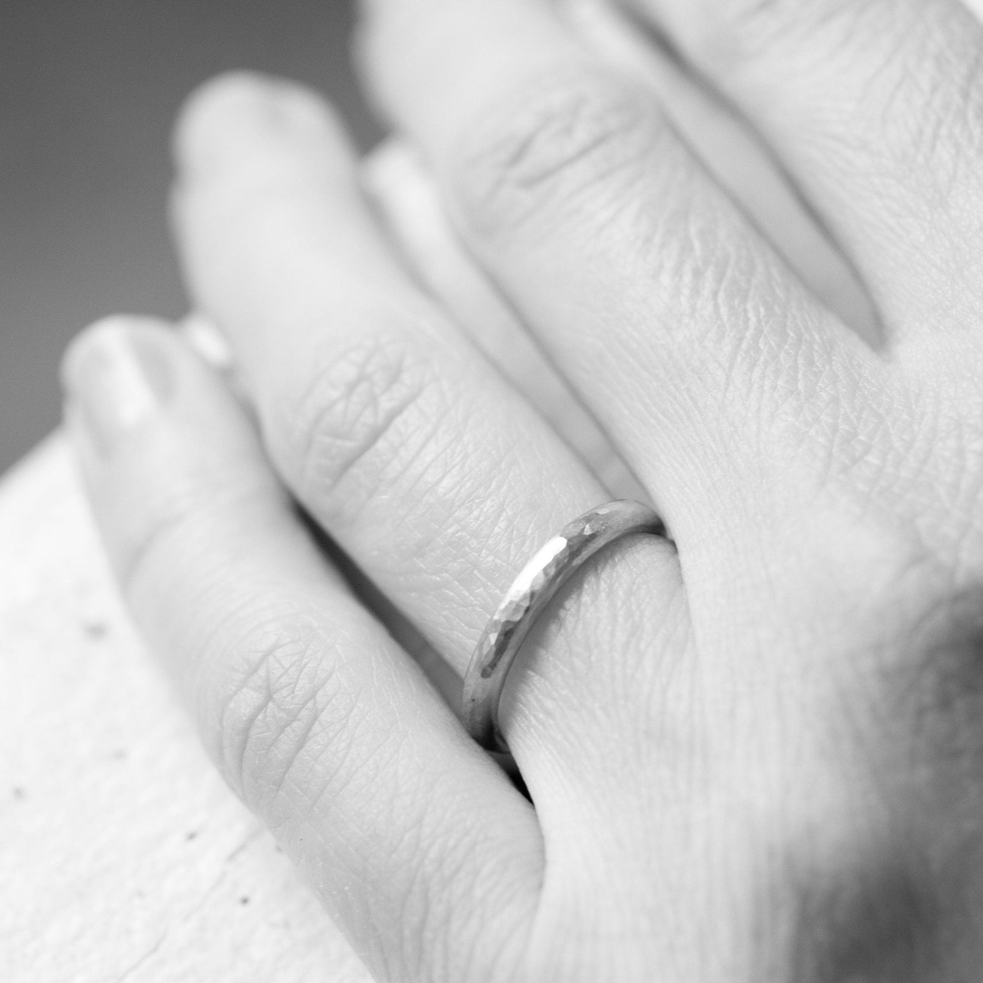 The White Gold Hammered Band (Ready to ship in 2mm width size 6.5 with a matte finish) - W.R. Metalarts